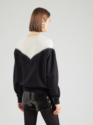 Bluză de molton 'JANEA_P1 10' de la DRYKORN pe negru