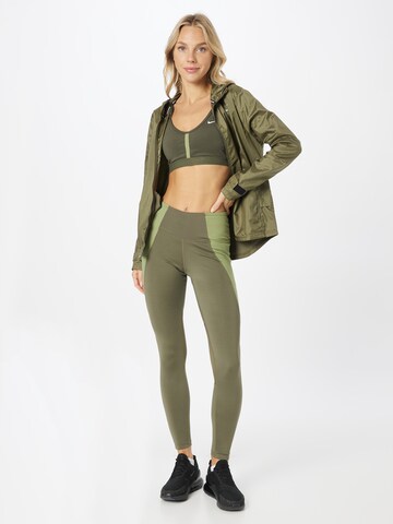 NIKE Skinny Sports trousers in Green