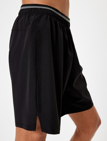 Koton Regular Hose in Schwarz