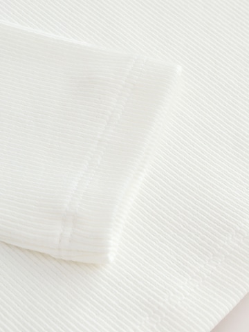 T-Shirt Next en blanc