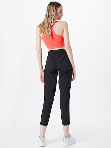 PUMA Loose fit Workout Pants 'Studio' in Black