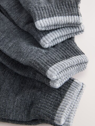 Guanto di Next in grigio