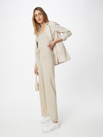 Haut River Island en beige