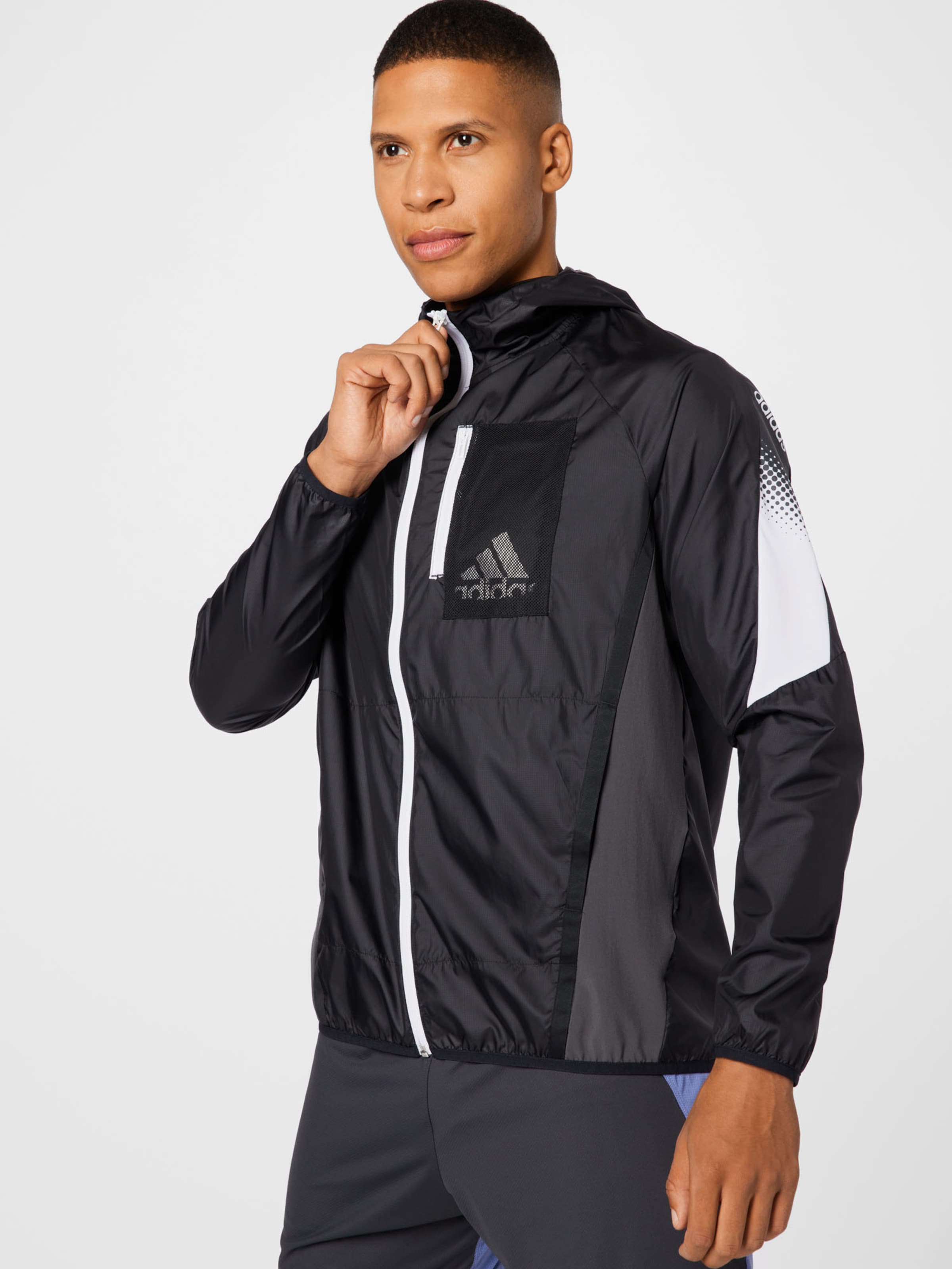 ADIDAS SPORTSWEAR Casaco deportivo Seaso em Preto ABOUT YOU