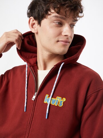 LEVI'S ® - Sudadera con cremallera 'Relaxed Graphic Zipup' en rojo