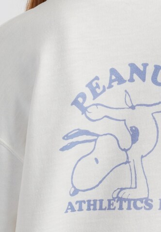 Chinti & Parker - Sudadera 'Peanuts Athletics' en beige