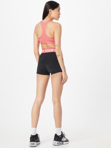 NIKE Skinny Sports trousers in Black