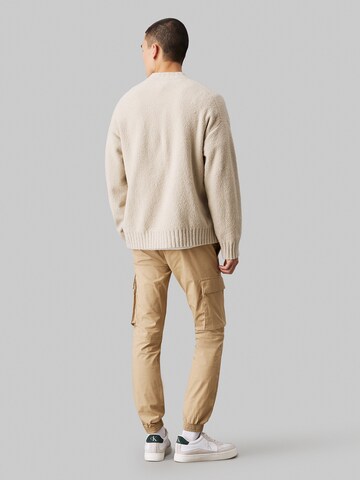 Calvin Klein Jeans Alt kitsenev Klapptaskutega püksid, värv beež