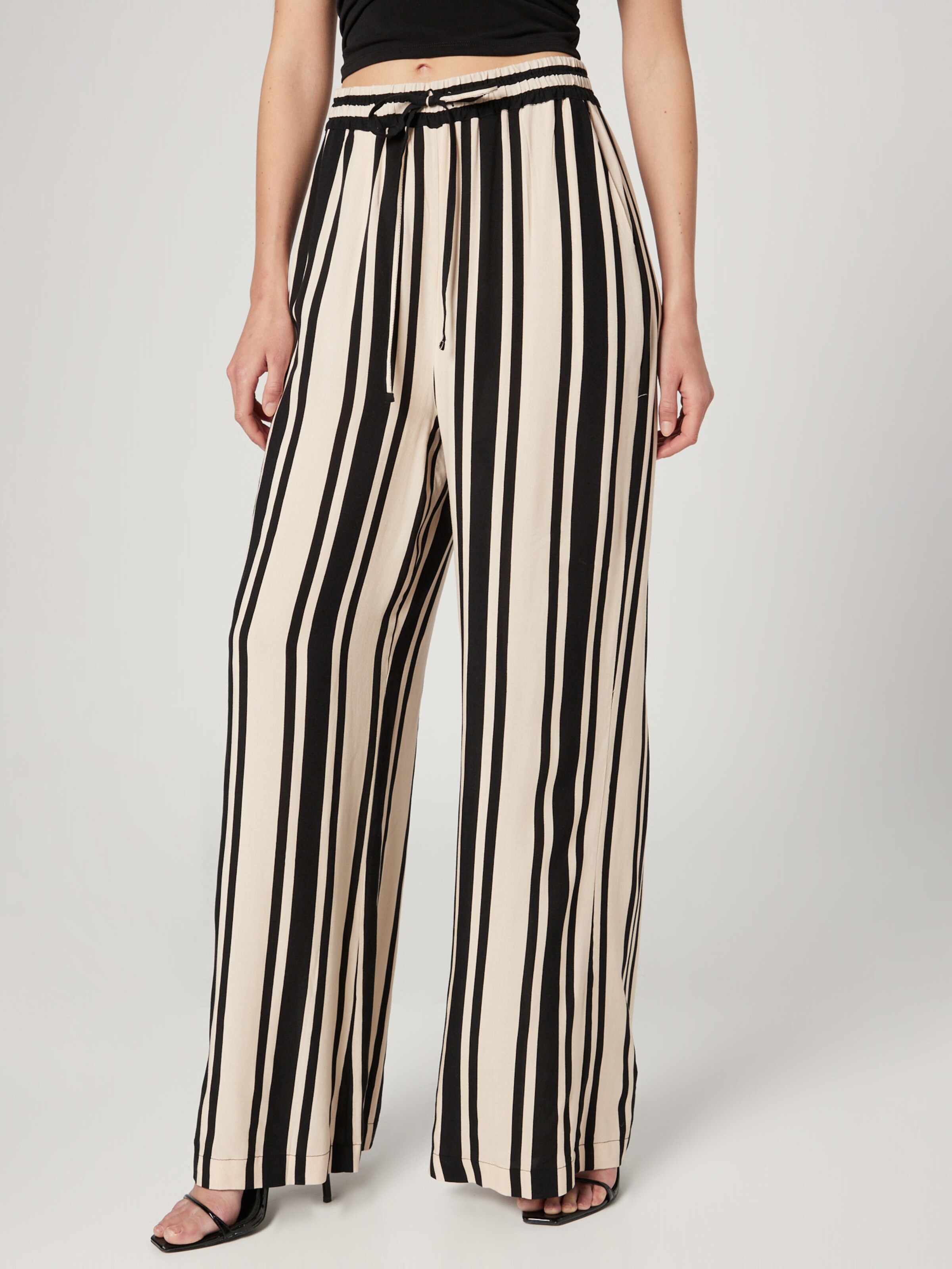 Inc black and white striped pants online