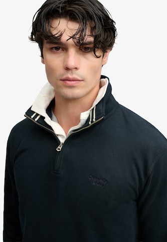 Superdry & Co Sweatshirt 'Essential Serif' in Blauw