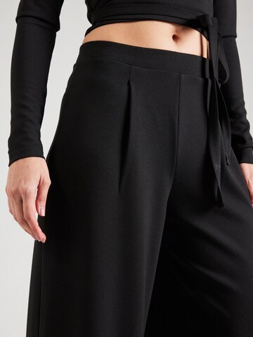ABOUT YOU Loose fit Trousers 'Hanna' in Black