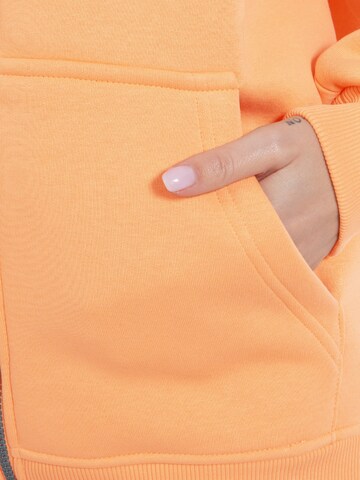 Veste de survêtement ' Eda ' Smilodox en orange