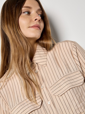 Chemisier ' ' Apricot en gris