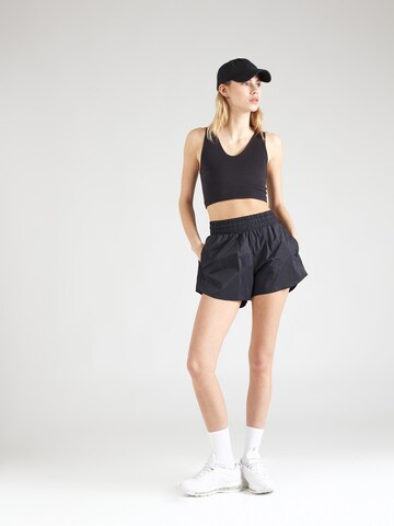 UNDER ARMOUR Regular Workout Pants 'Flex' in Black