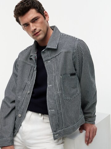 TOMMY HILFIGER Tussenjas in Blauw