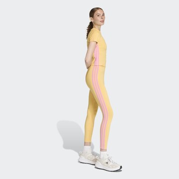 ADIDAS SPORTSWEAR Skinny Workout Pants 'Essentials' in Yellow