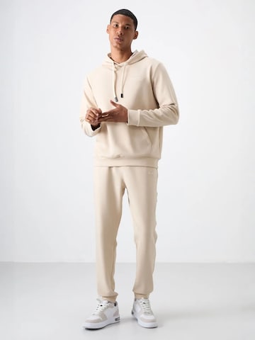 Tommy Life Tracksuit in Beige