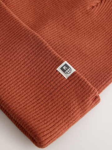 Bonnet Next en rouge