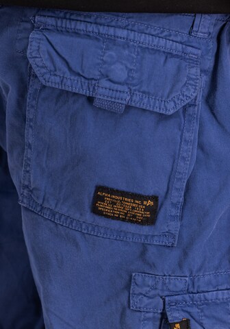 ALPHA INDUSTRIES Regularen Hlače | modra barva