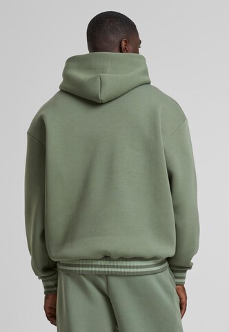 Karl Kani Sweatshirt 'Ellipse' in Green