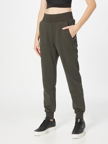 BJÖRN BORG Tapered Workout Pants in Green: front