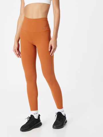 NIKE Skinny Workout Pants 'ZENVY' in Orange: front