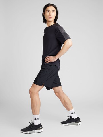 UNDER ARMOUR regular Sportsbukser i sort