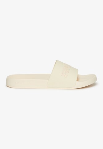 Claquettes / Tongs Superdry en blanc