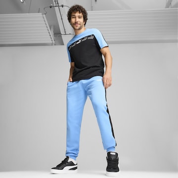 PUMA Regular Trousers 'Around The Block' in Blue