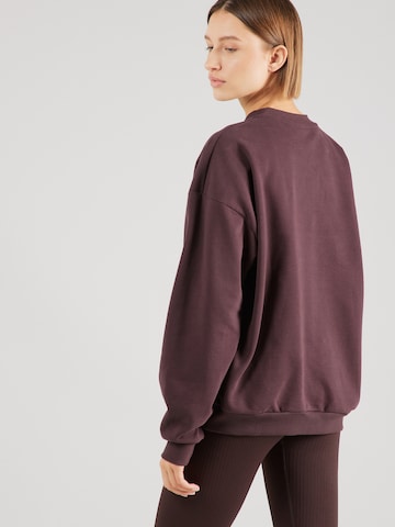 Sweat de sport aim'n en marron