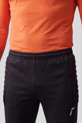 REUSCH Slimfit Sportbroek in Zwart