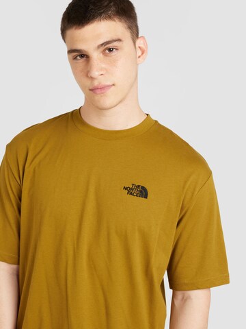 THE NORTH FACE T-shirt i grön