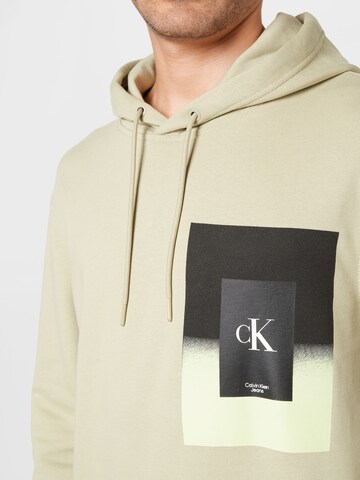 Calvin Klein Jeans Collegepaita värissä beige