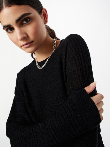 Pull-over Sisley en noir