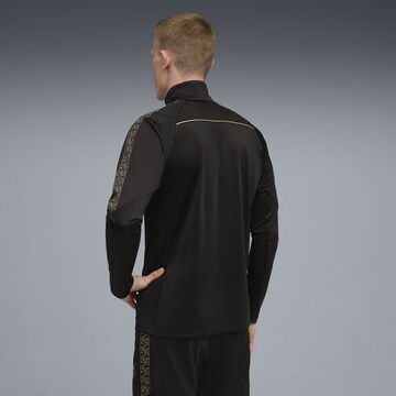 T-Shirt fonctionnel 'King Touch' PUMA en noir