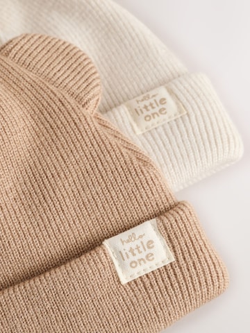 Next Pipo värissä beige
