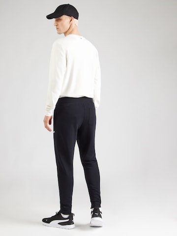 Tapered Pantaloni sportivi 'ESSENTIAL 4' di BJÖRN BORG in nero