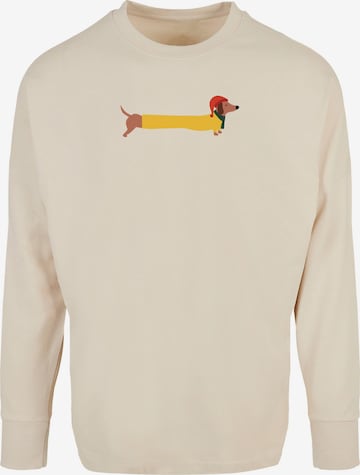 T-Shirt 'Christmas Dog' Merchcode en beige : devant