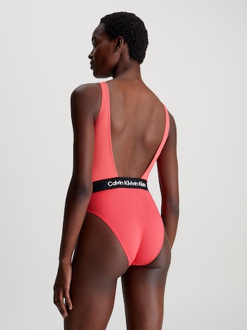 Calvin Klein Swimwear Bustier Badpak in Oranje