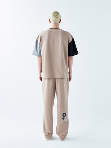 VAMOS CLO Loosefit Nadrág 'Bedford' - bézs