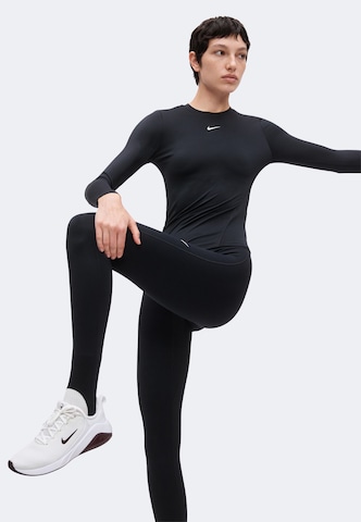 NIKE Skinny Sporthose in Schwarz