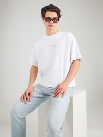balta Calvin Klein Jeans Marškinėliai 'OBSESSION'