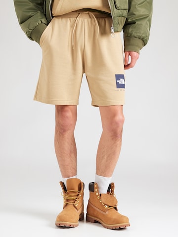 Regular Pantaloni 'BOX NSE' de la THE NORTH FACE pe verde: față