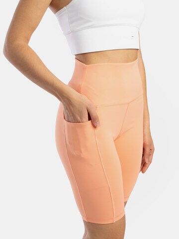 Skinny Pantalon de sport Spyder en orange