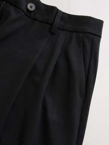 Wide leg Pantaloni con pieghe di Next in nero