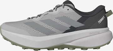 Chaussure de sport ADIDAS PERFORMANCE en gris : devant