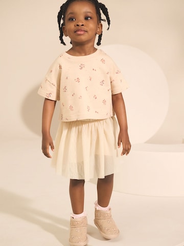 Next Set in Beige: front