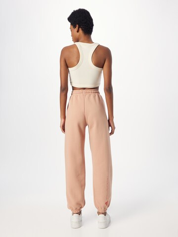 Effilé Pantalon de sport ADIDAS BY STELLA MCCARTNEY en rose