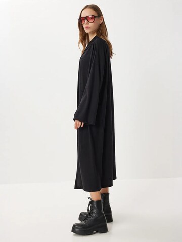 Happiness İstanbul Gebreide mantel in Zwart