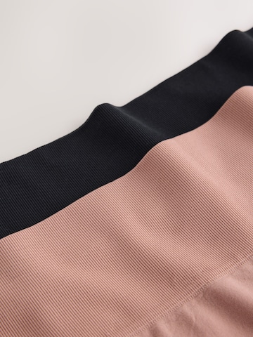 Pantaloni modellanti di Next in rosa